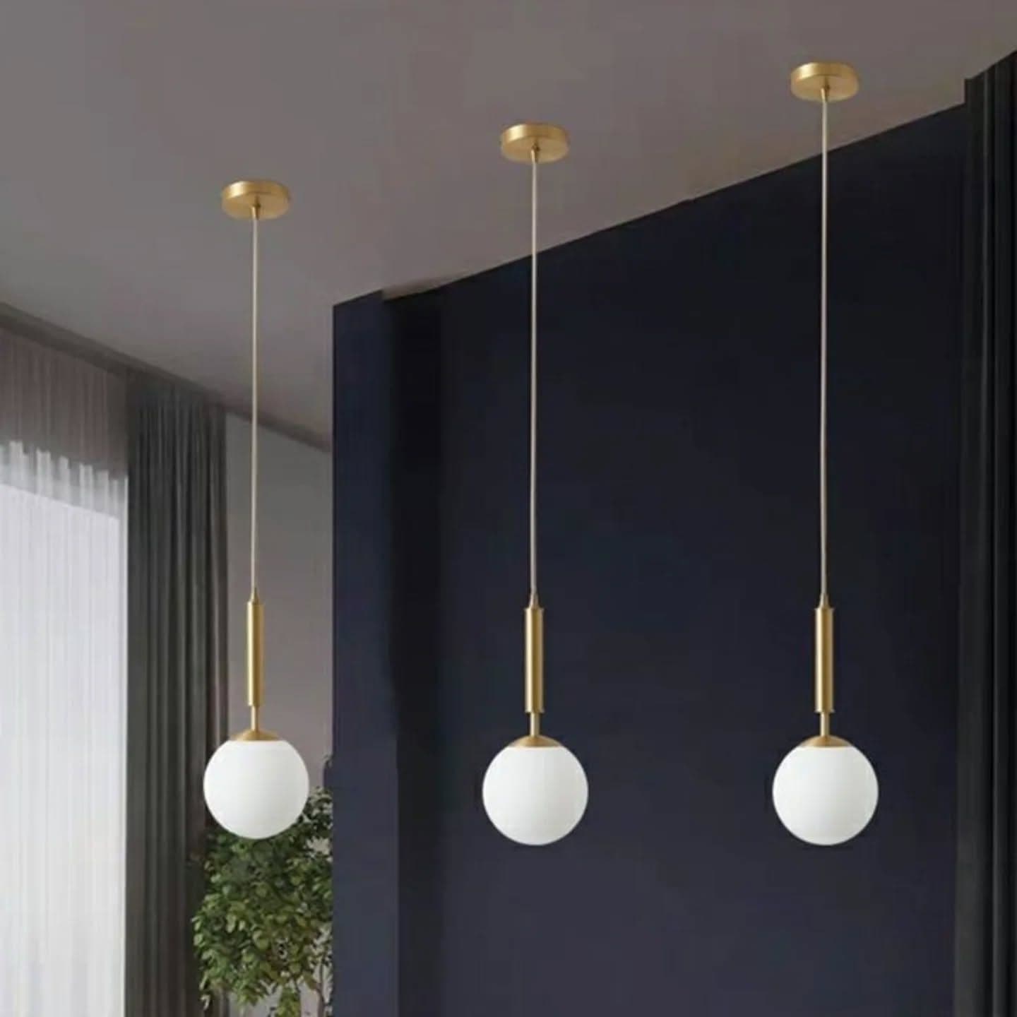 Modern Gold Globe Pendant Light with Brass Accent