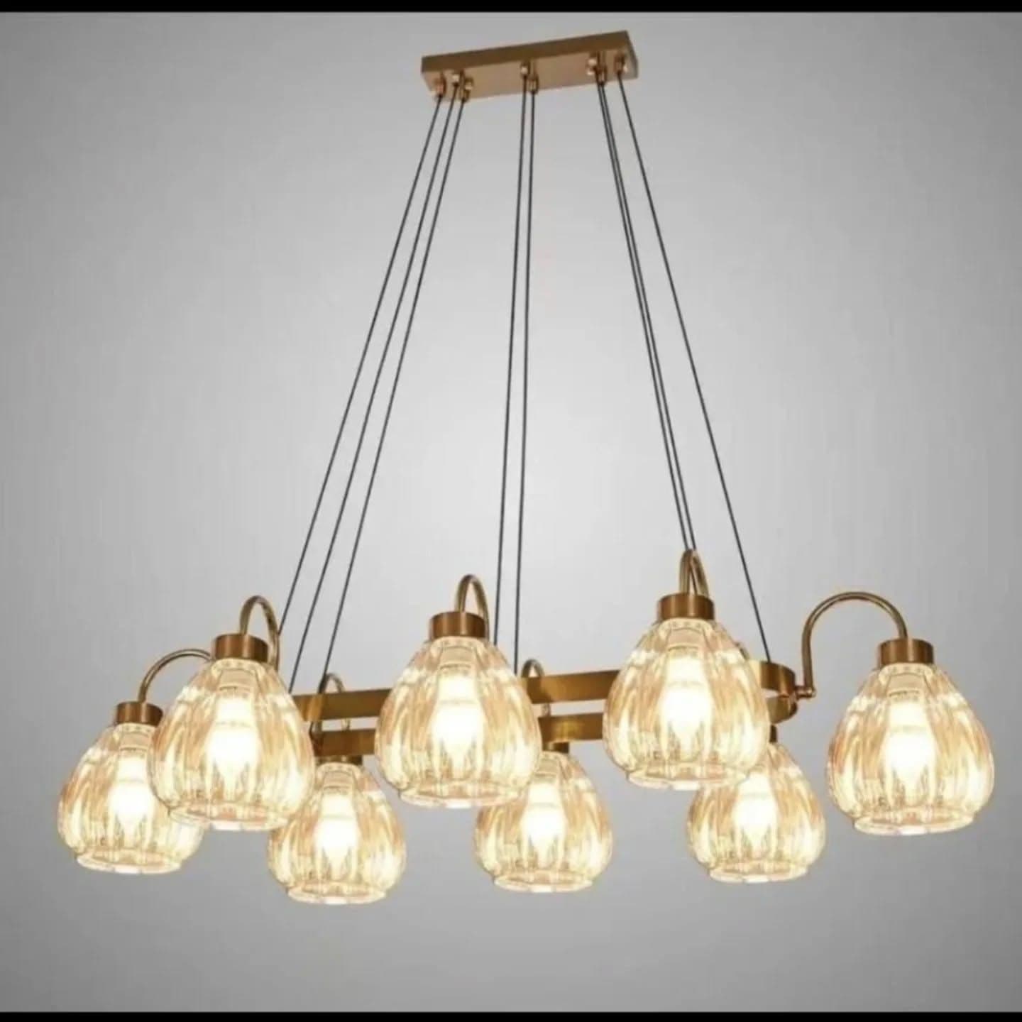 Modern Gold Brass 8-Light Pendant Chandelier with Amber Glass Shades