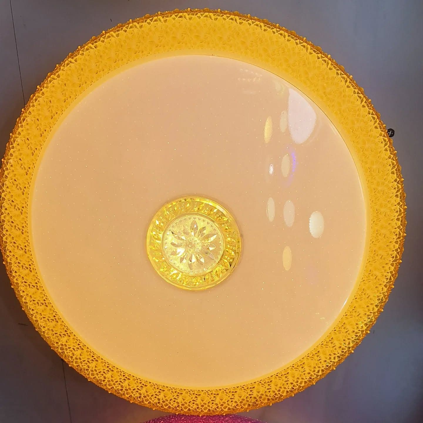 Ornate Gold Crystal Chandelier with Decorative Rim