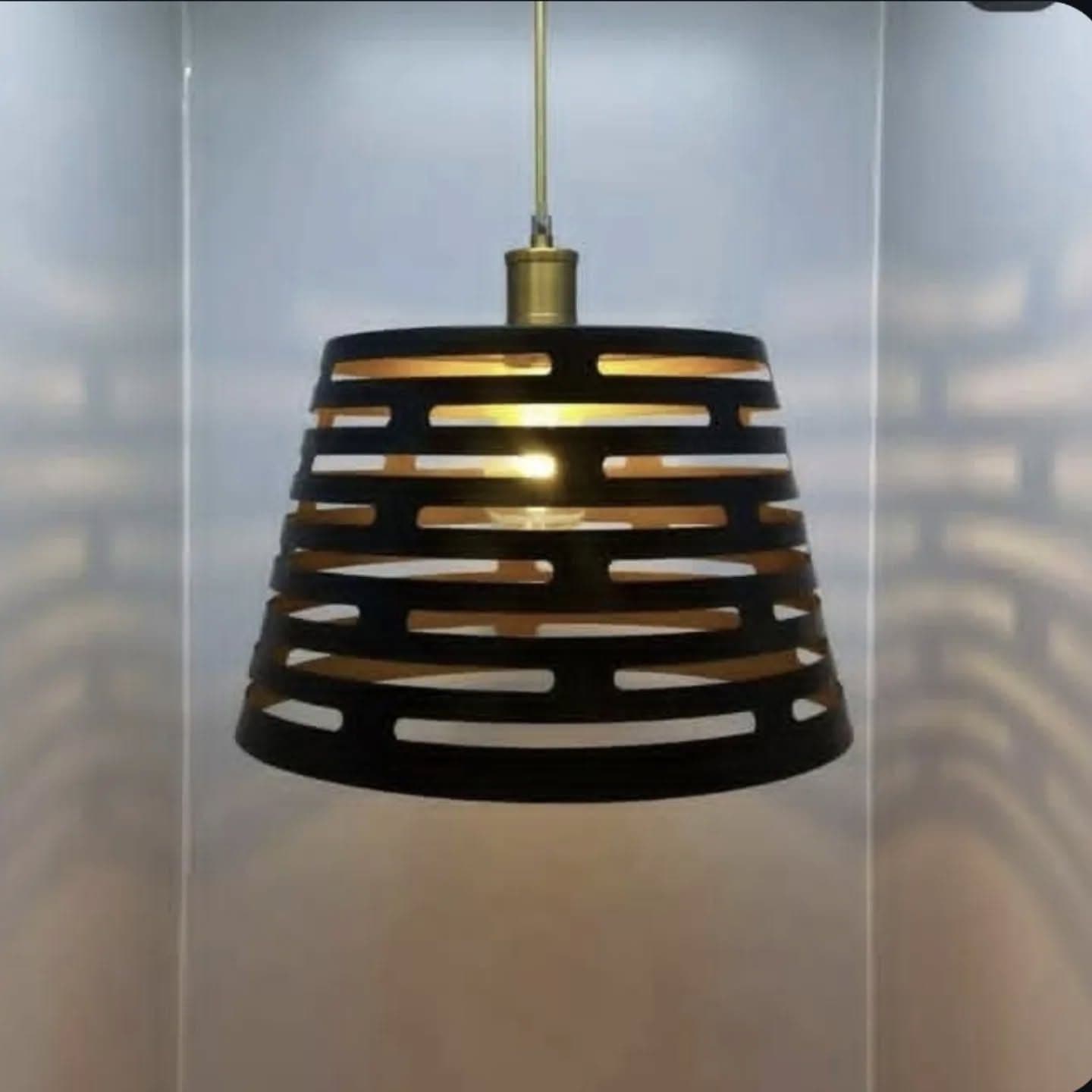 Modern Black and Gold Cut-Out Pendant Light