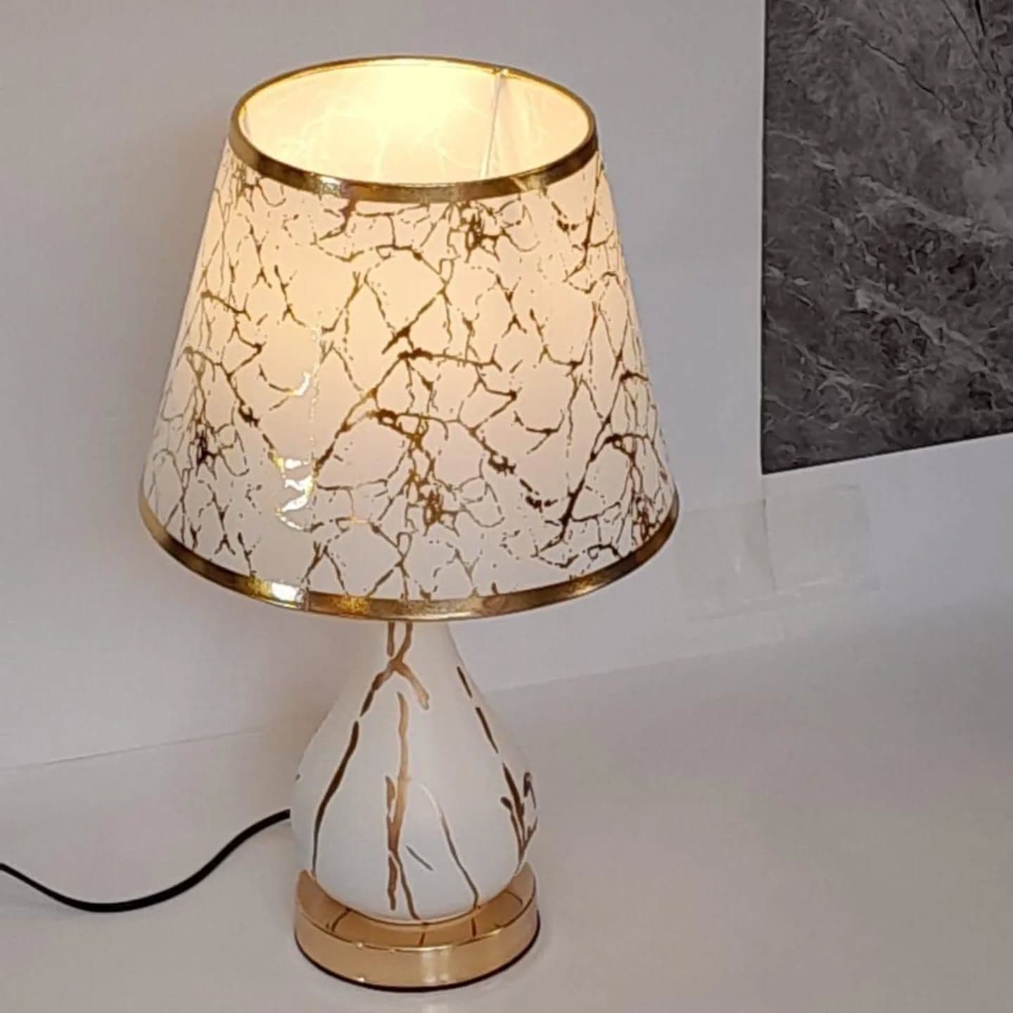 Elegant Gold and White Patterned Glass Wall Light