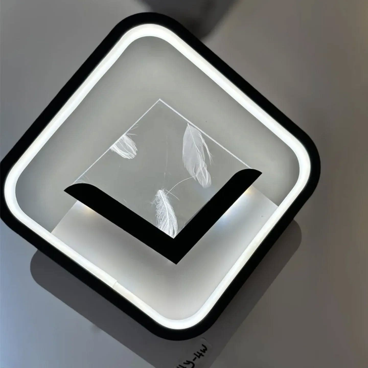 Modern Black Feather LED Wall Light - Geometric Design
