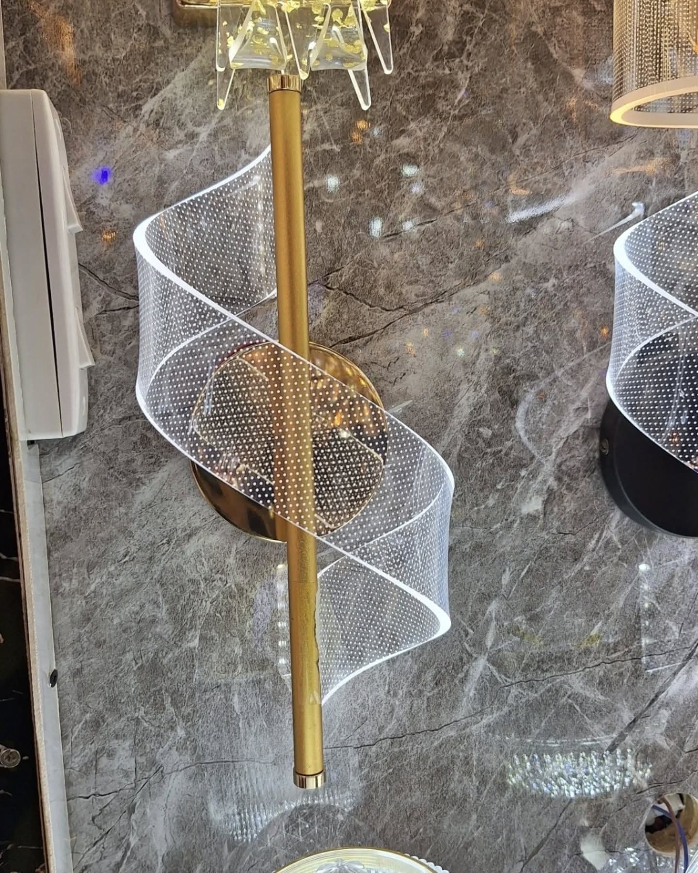 Modern Gold Spiral LED Wall Light with Perforated Design