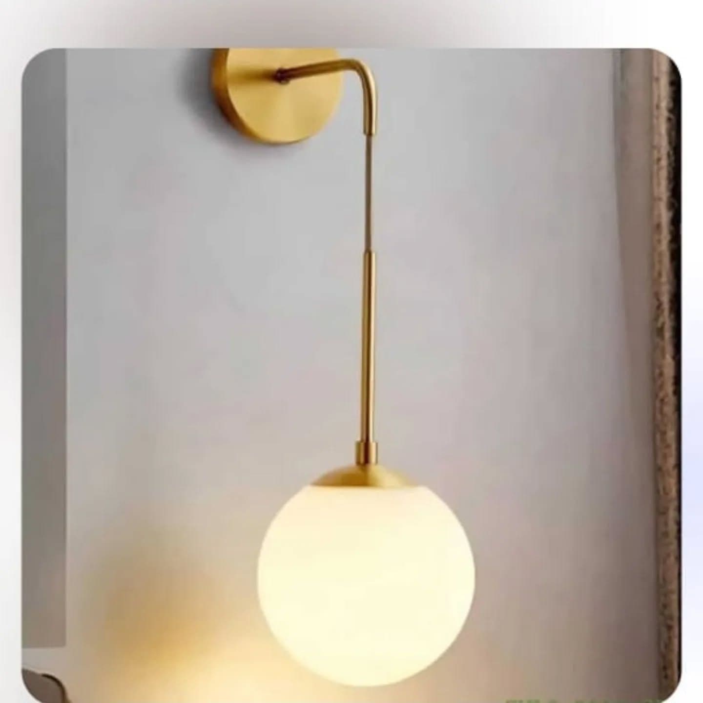 Modern Gold Brass Wall Light with Frosted Glass Globe