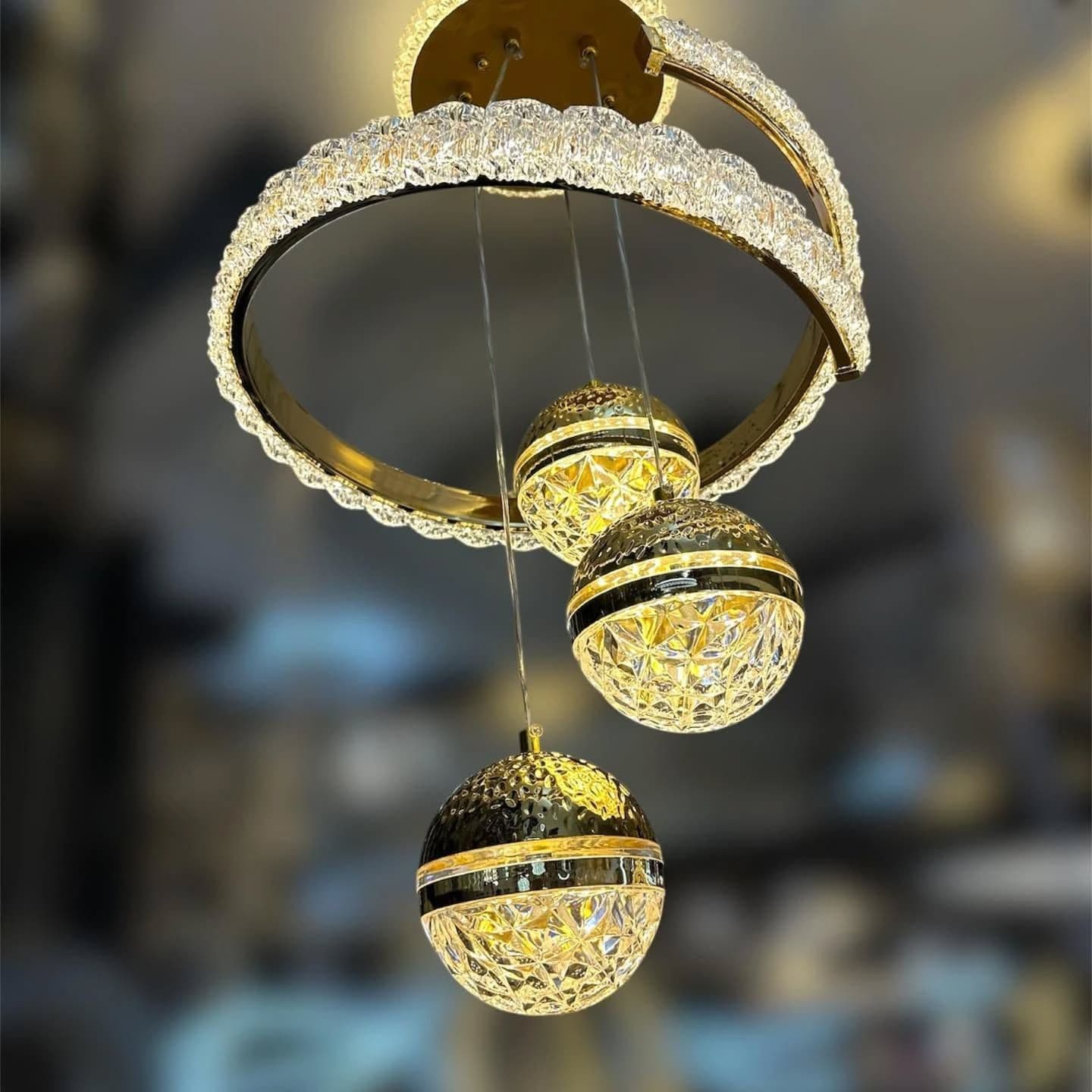 Modern Gold Orb Chandelier with Crystal Accents