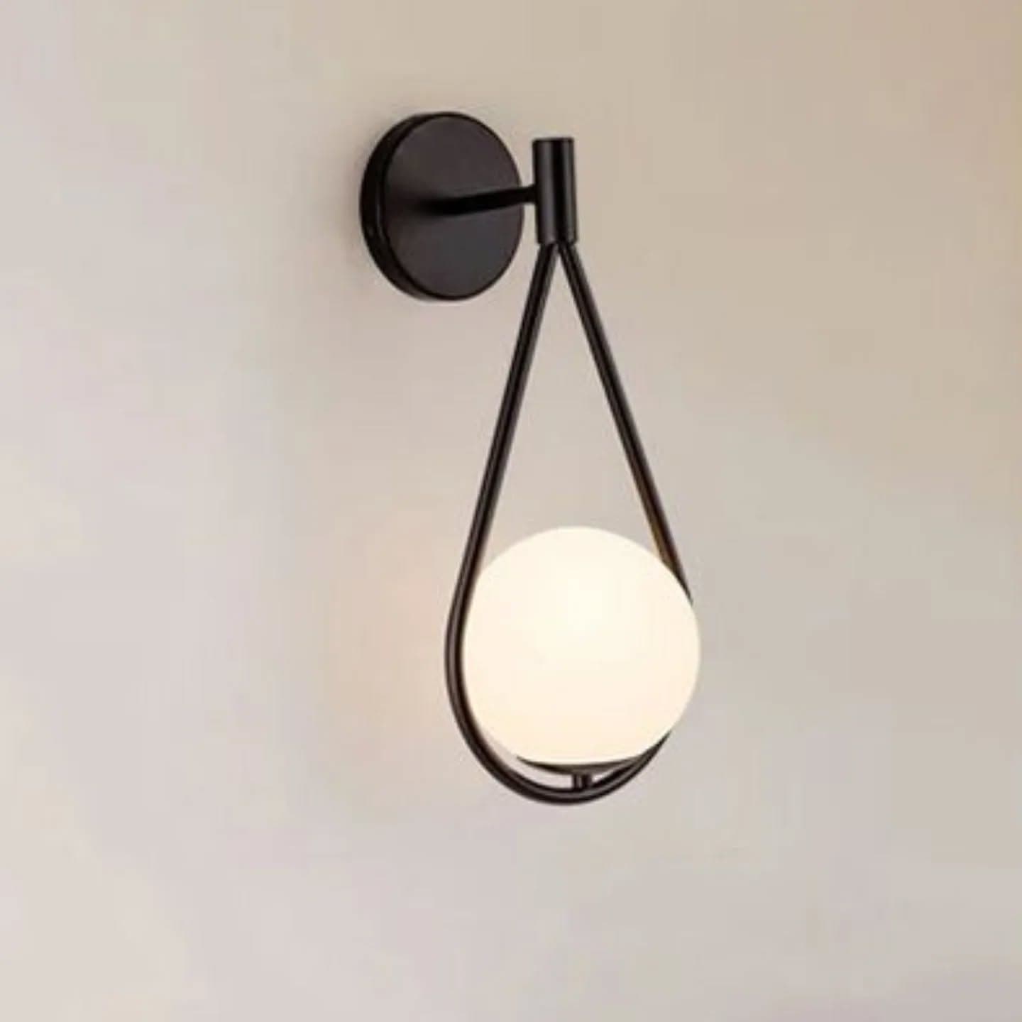 Modern Black Globe Wall Light with Tear-Drop Frame