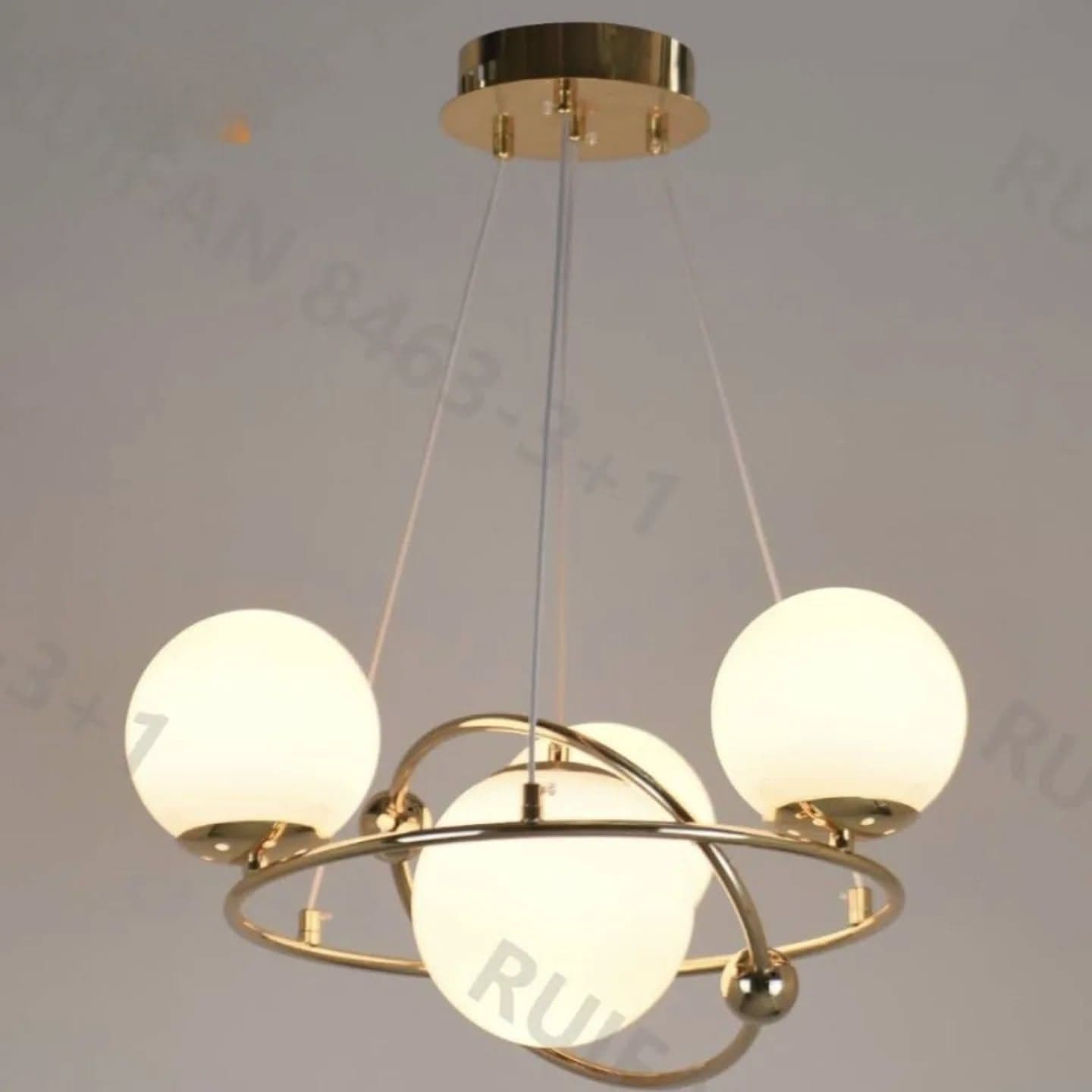 Minimalist Gold Orbital Chandelier with Glass Orbs