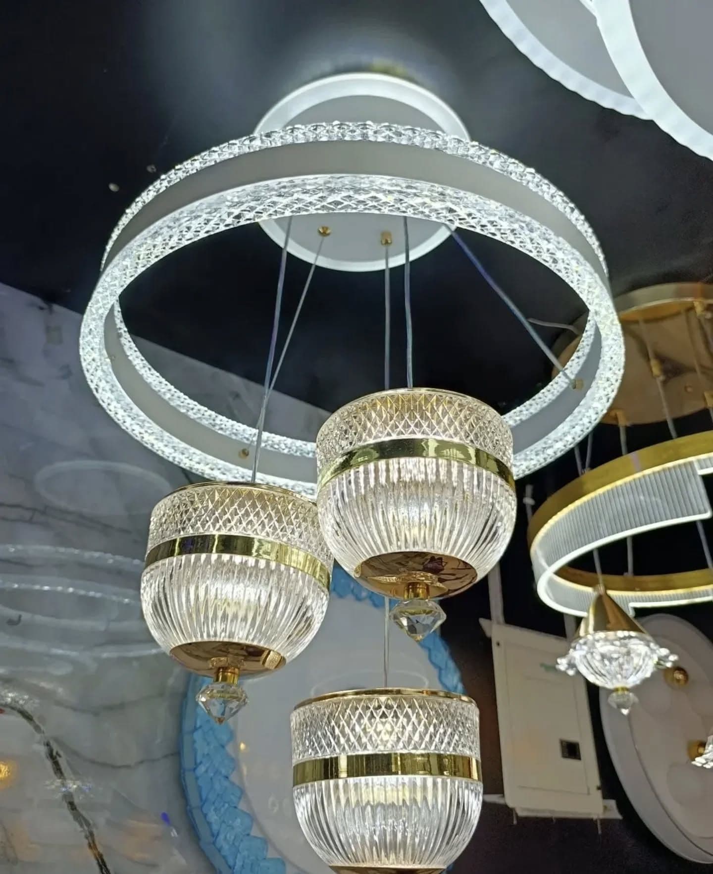 Modern Multi-Tiered Gold and Crystal Ring Chandelier with Hanging Glass Globes