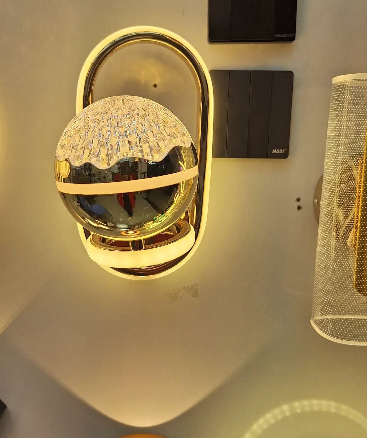 Modern Gold Crystal Wall Light with Reflective Orb